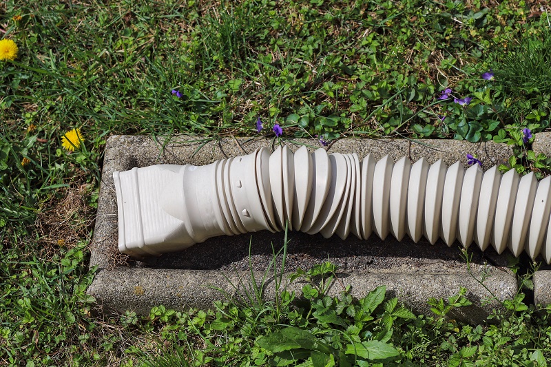 How To Use Downspout Extenders to Protect Your Foundation